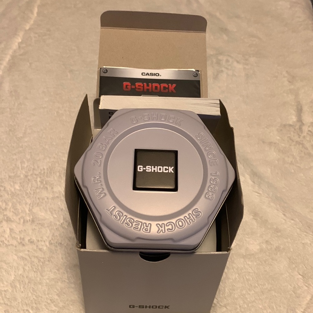 Never worn -G-shock watch. New in box with unopened warranty card